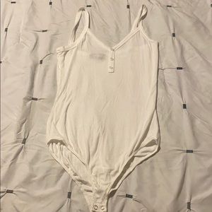 Women’s white bodysuit.